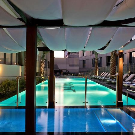 Damac Maison The Vogue Dubai Exterior foto The pool at the hotel