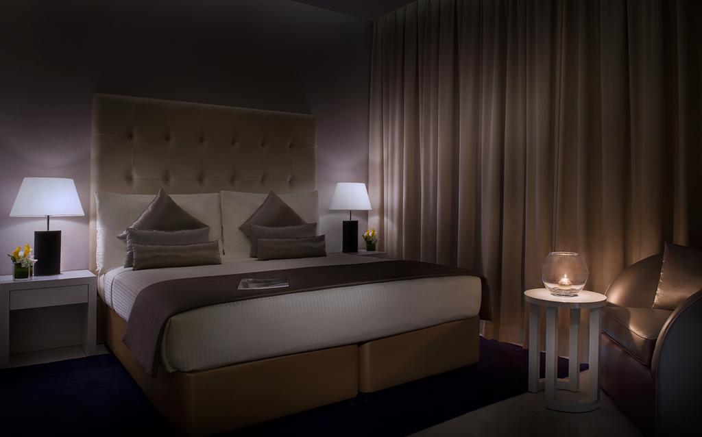 Damac Maison The Vogue Dubai Exterior foto A bedroom at the hotel
