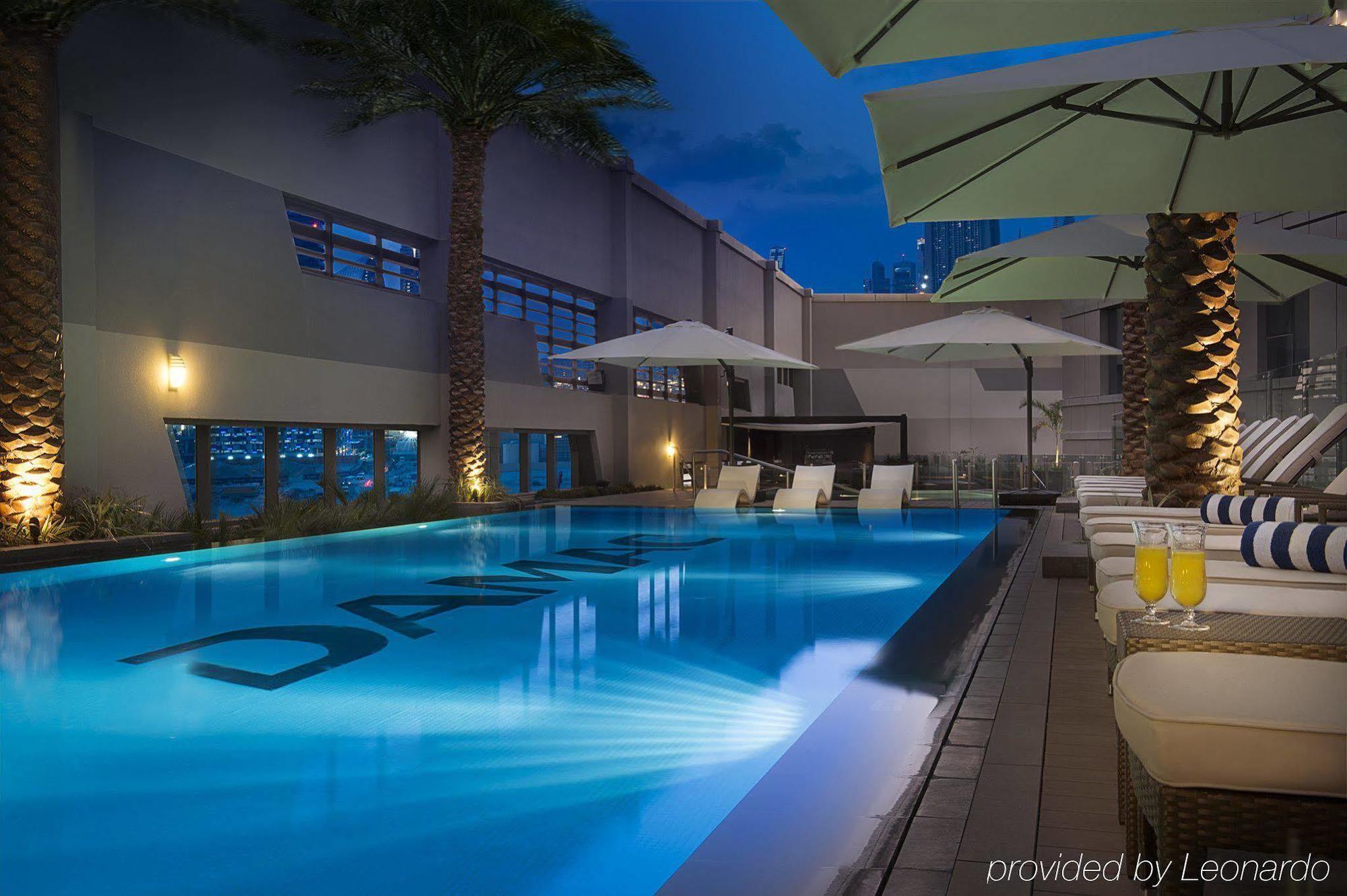 Damac Maison The Vogue Dubai Exterior foto The pool at the hotel